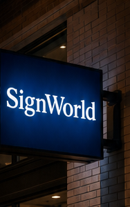 Blue SignWorld cabinet sign mounted outside