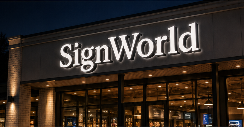 SignWorld front-lit channel letters above a storefront at night