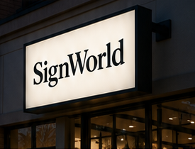 A blue SignWorld cabinet sign glowing at night